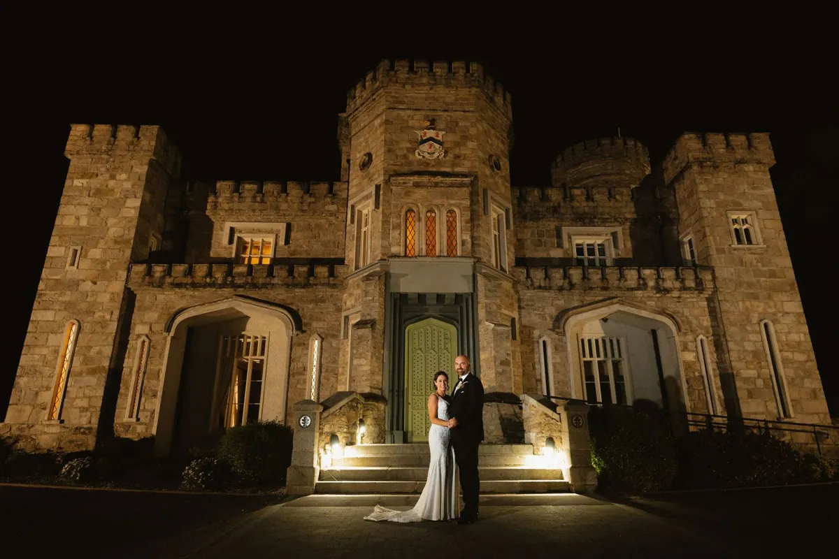 Bride standing outside Killeavy Castle during wedding portraits