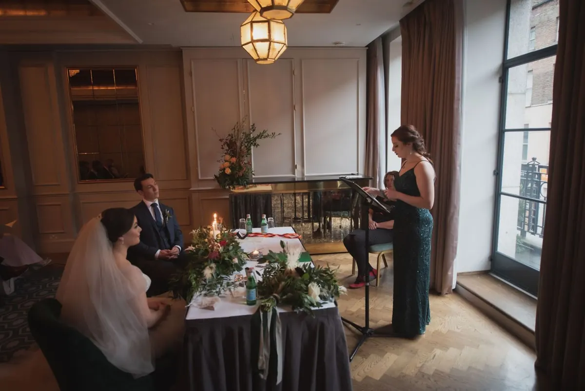 A reading beside the couple during the ceremony