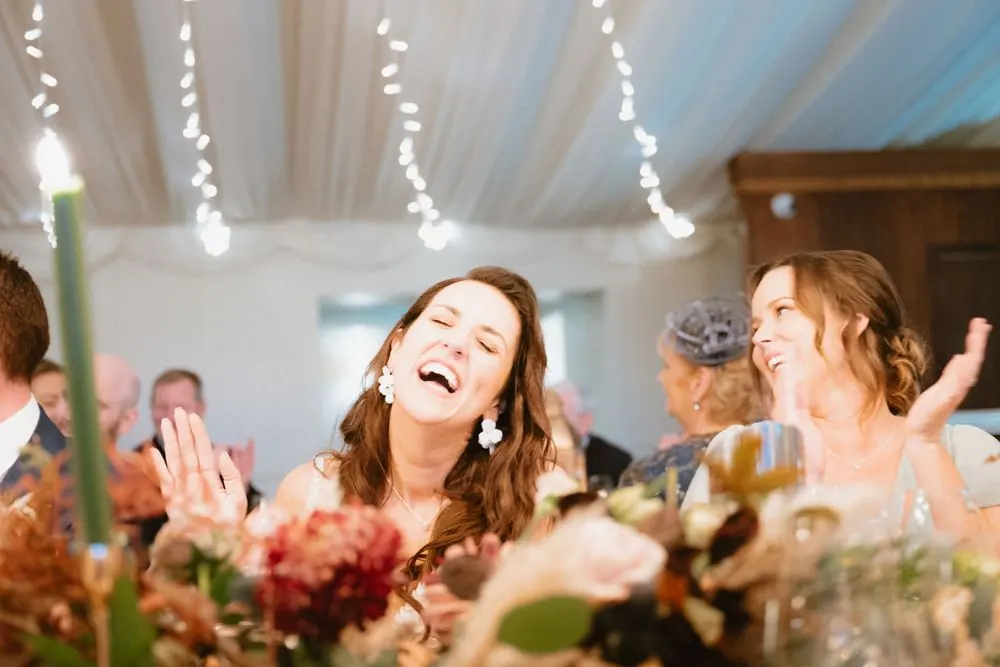 Laughter during the wedding speeches.