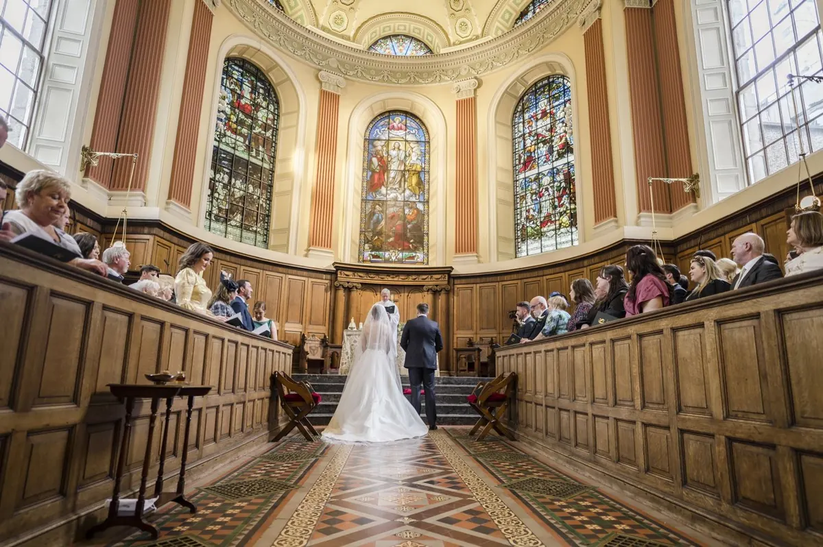 A wide view of Carole and Stephen’s ceremony inside Trinity College Chapel