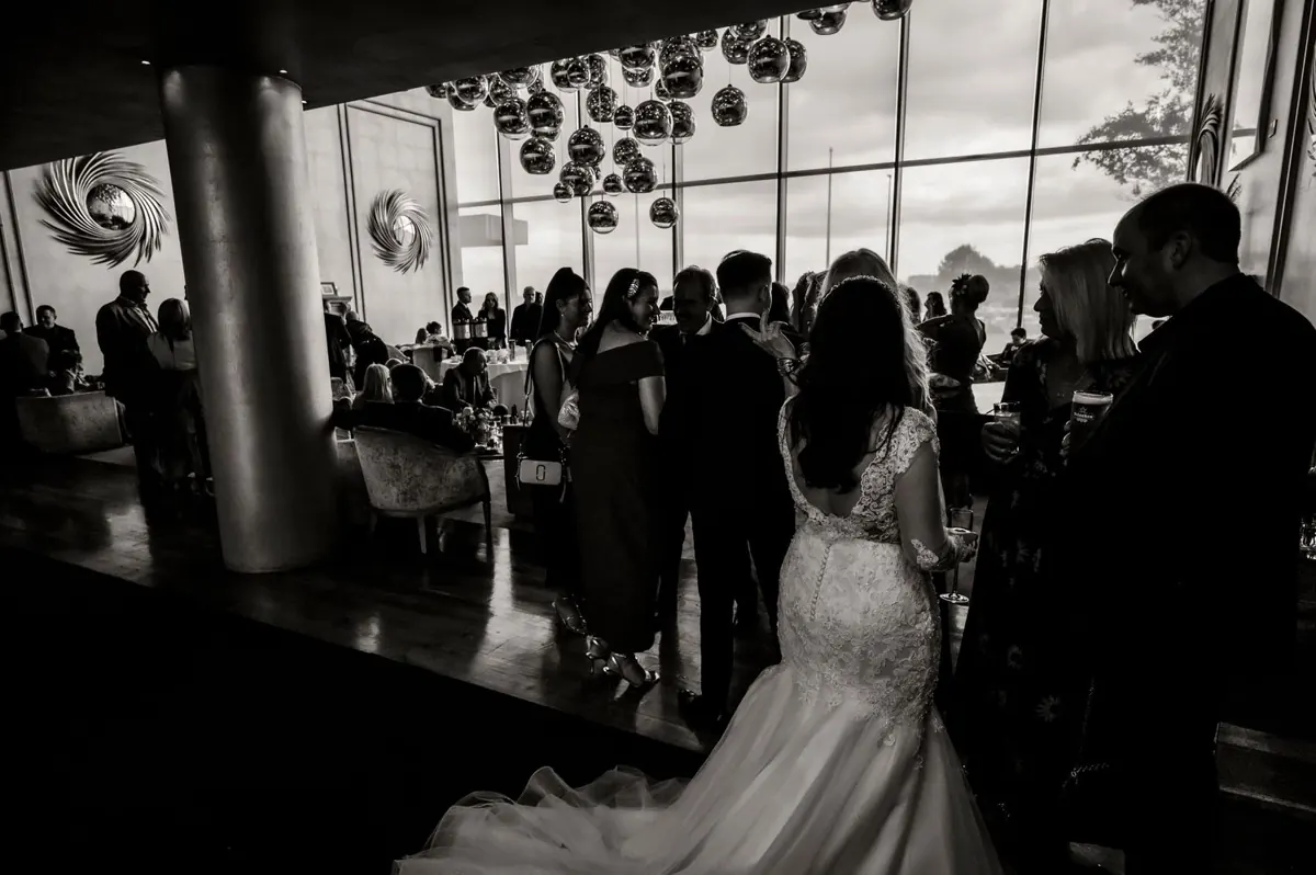 Michelle and Chris together in the hotel reception room.