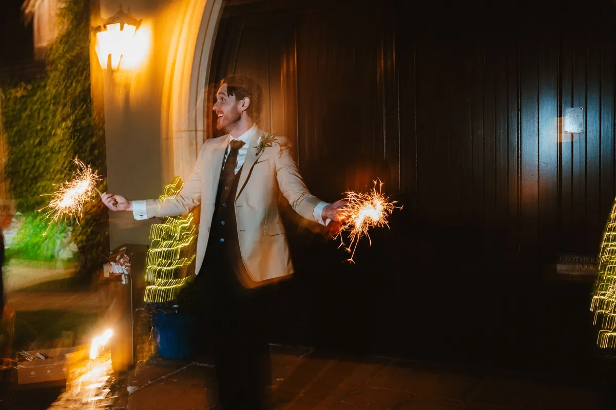 Creative long-exposure sparkler portrait of the bride and groom at BrookLodge.