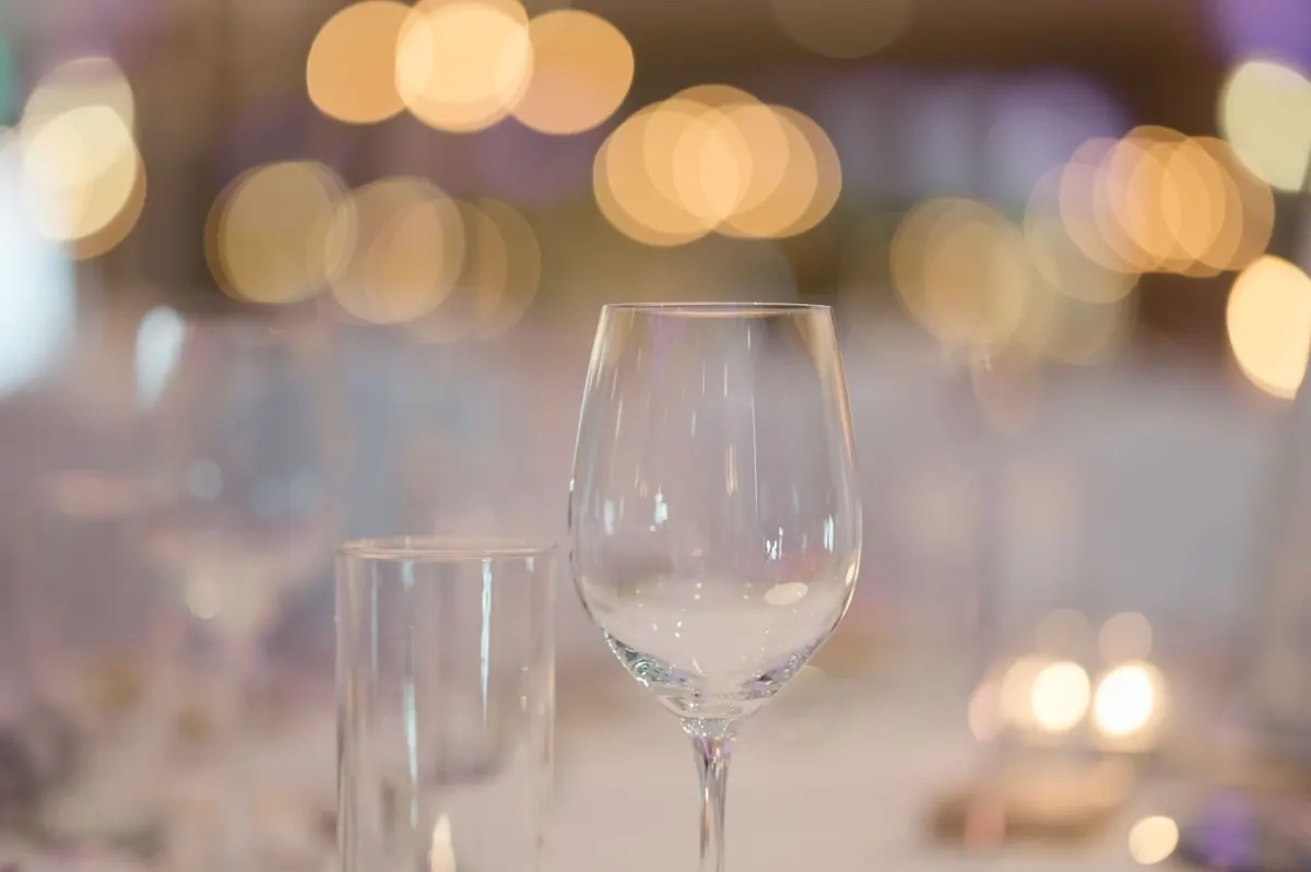 Warm reflections and reception table details.