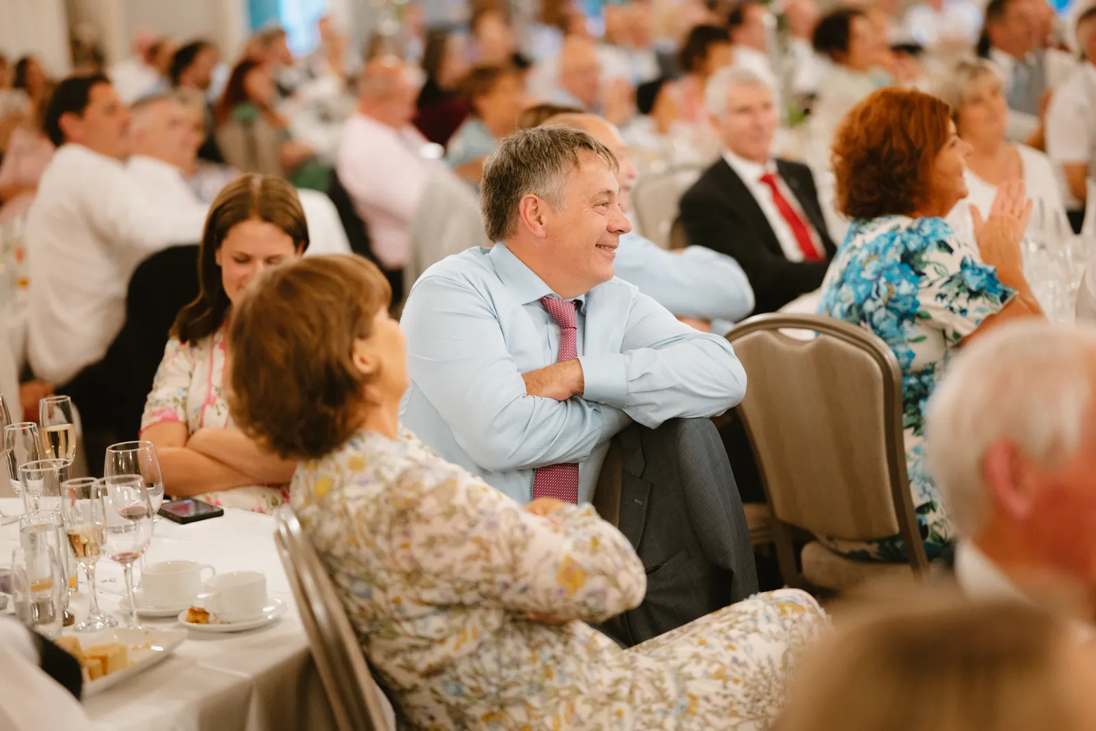Guests laughing during the speeches