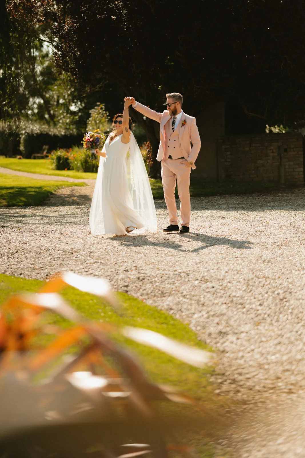 Aoife turns beside Ben on the gravel