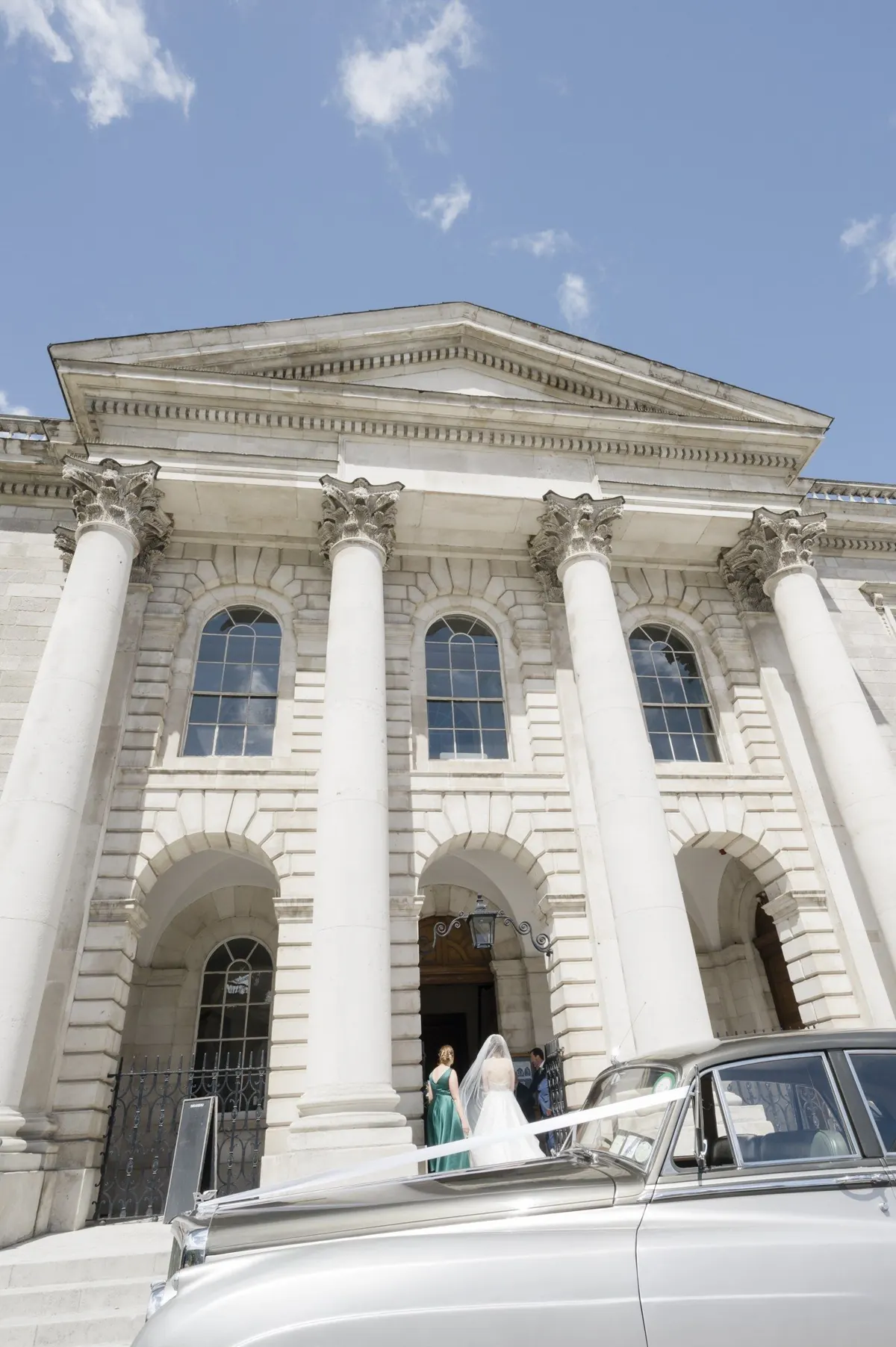 The chapel entrance and wedding car in Trinity’s Front Square