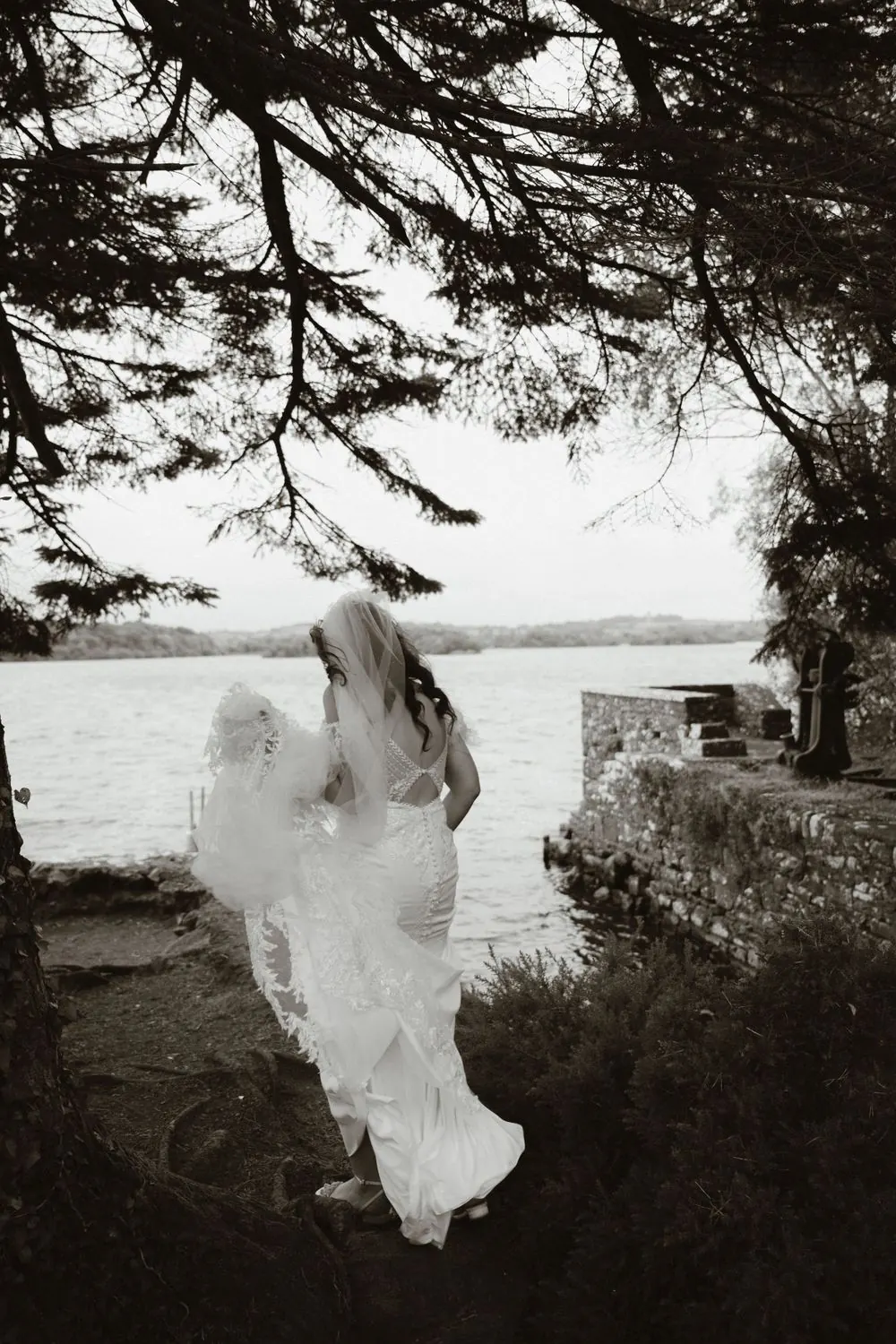 Aine beneath the trees beside the water at Virginia Park Lodge.