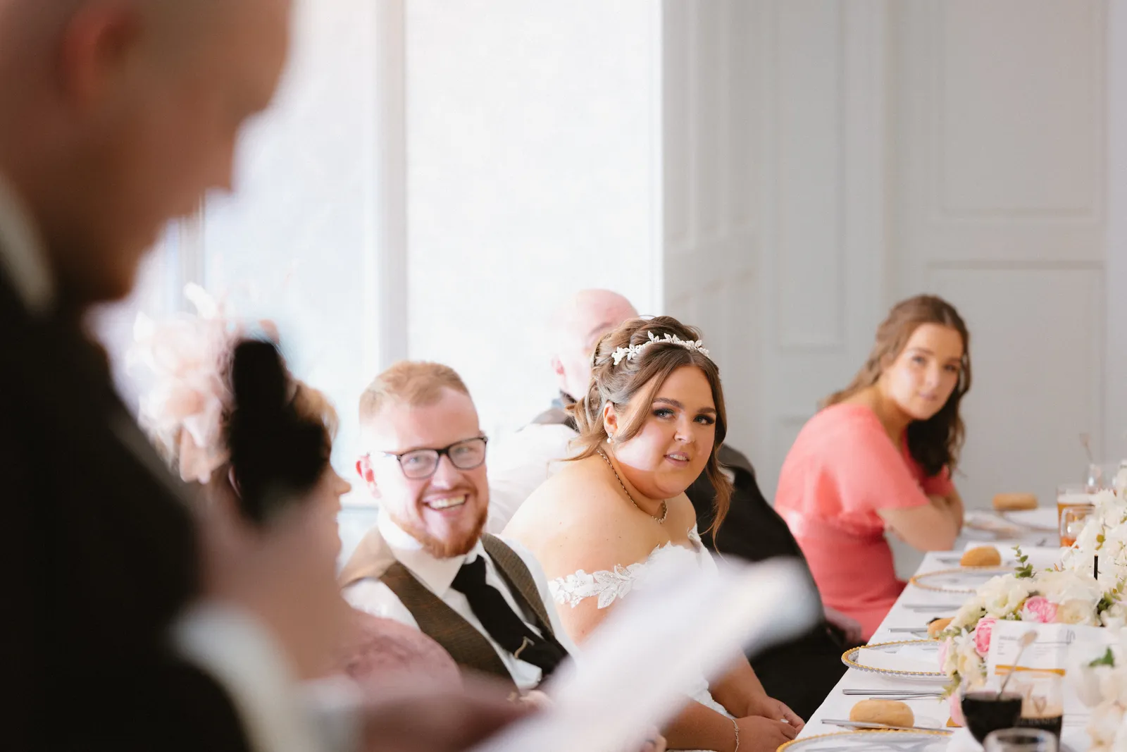 The couple listen to a speech