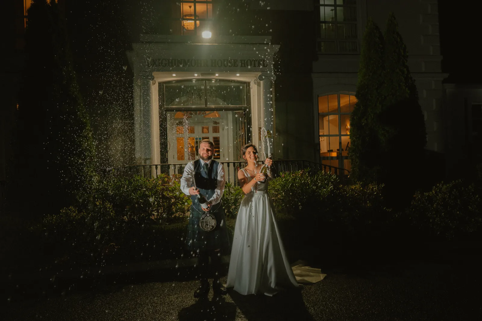 Chloe and Clarke outside Leighinmohr House in the evening.