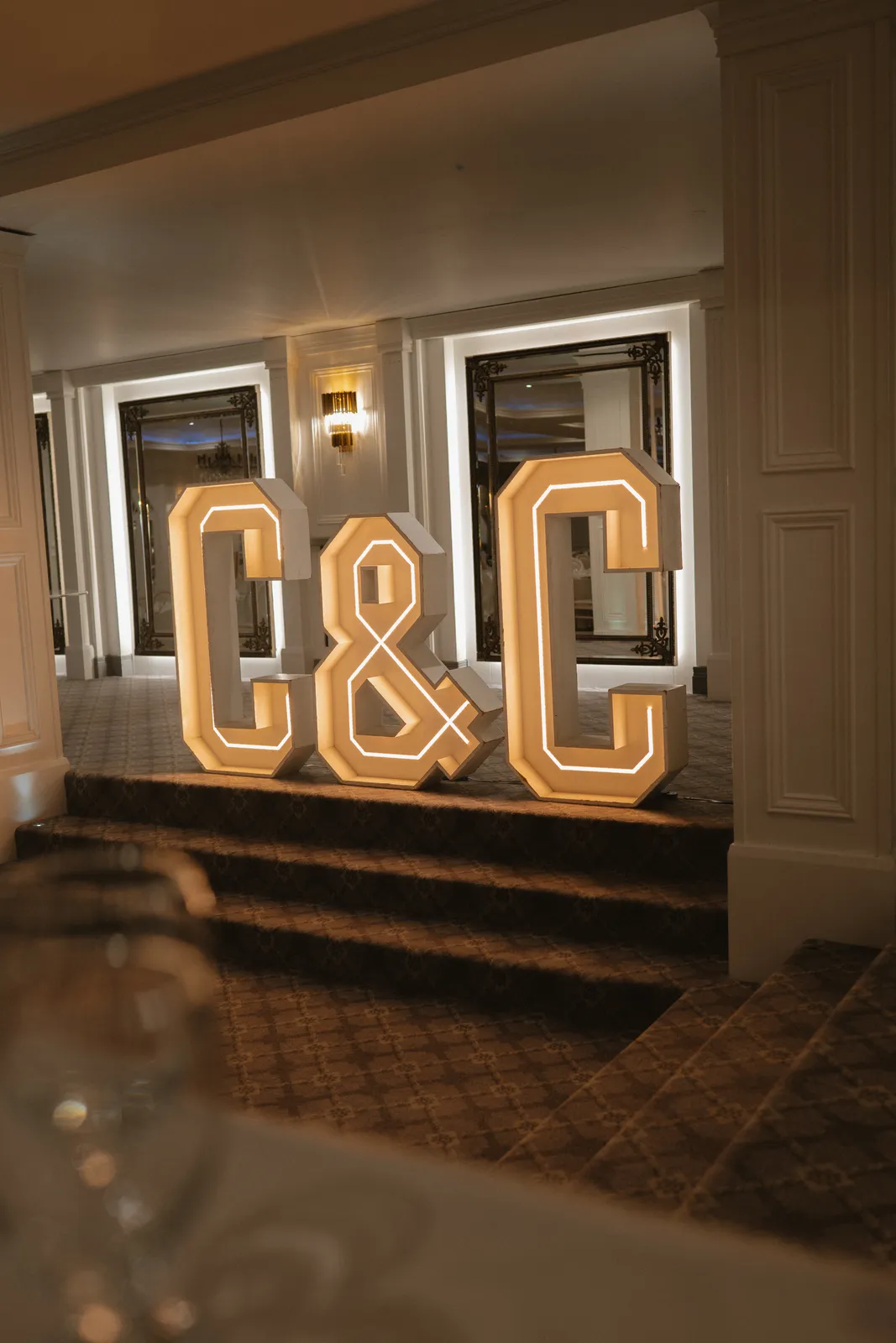 Illuminated initials in the reception room