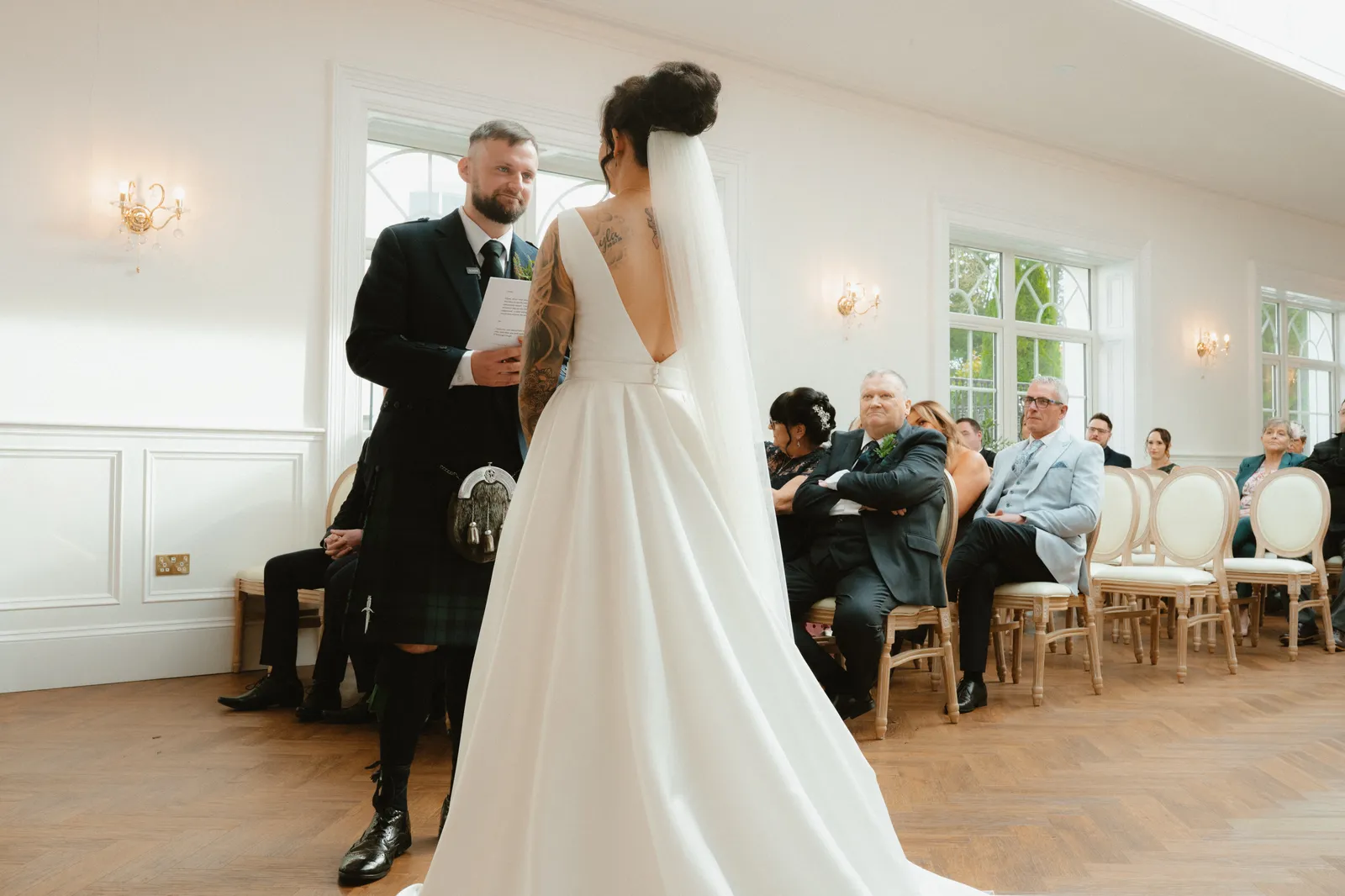 The ceremony beneath the glass roof