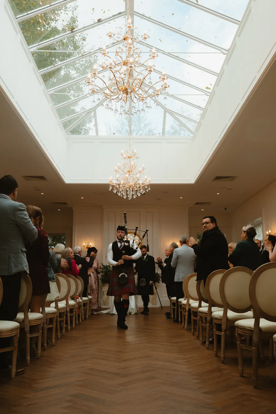 The couple walk back up the aisle