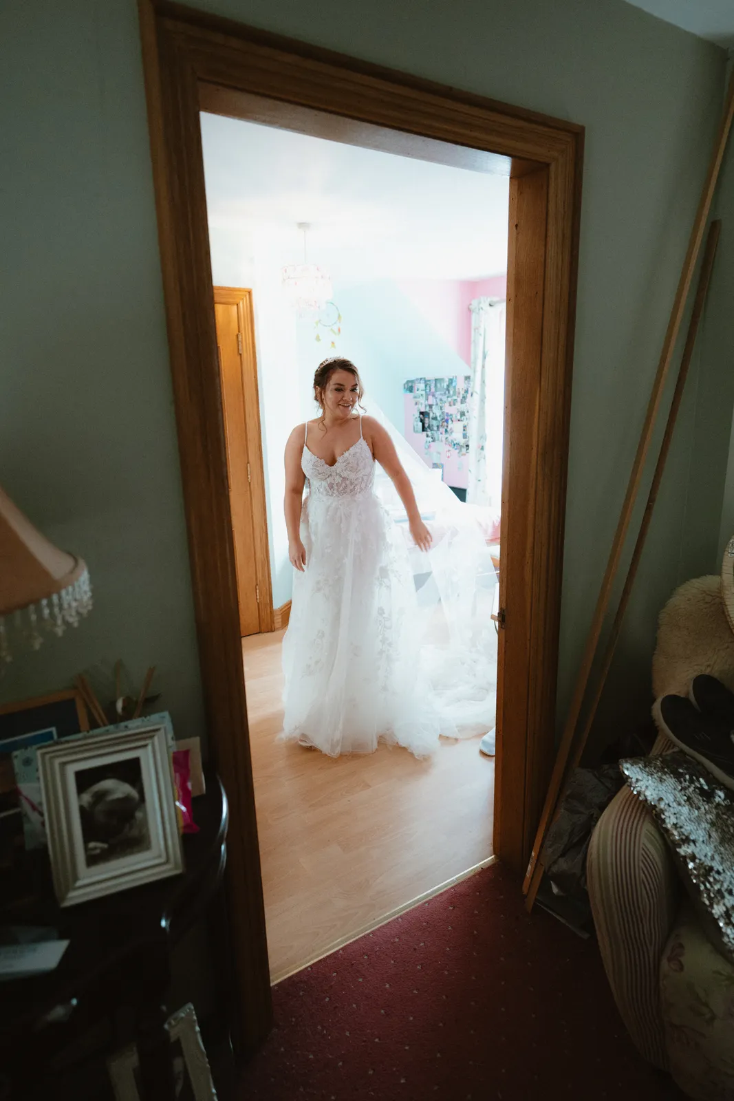 Claire framed by a doorway