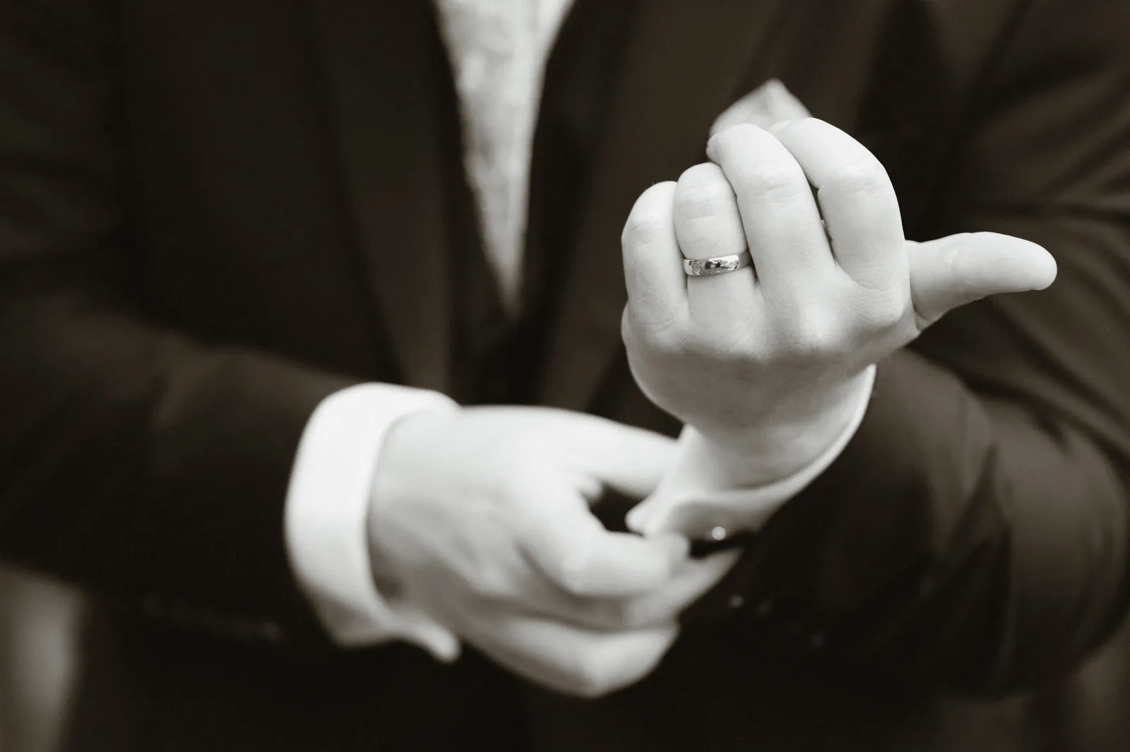 Close view of Will adjusting a cuff