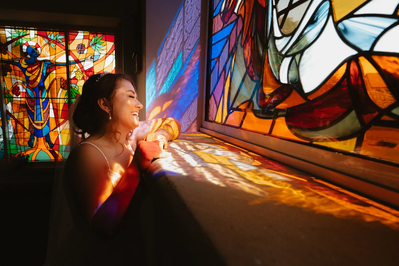 Stained-glass colour across Claire’s portrait