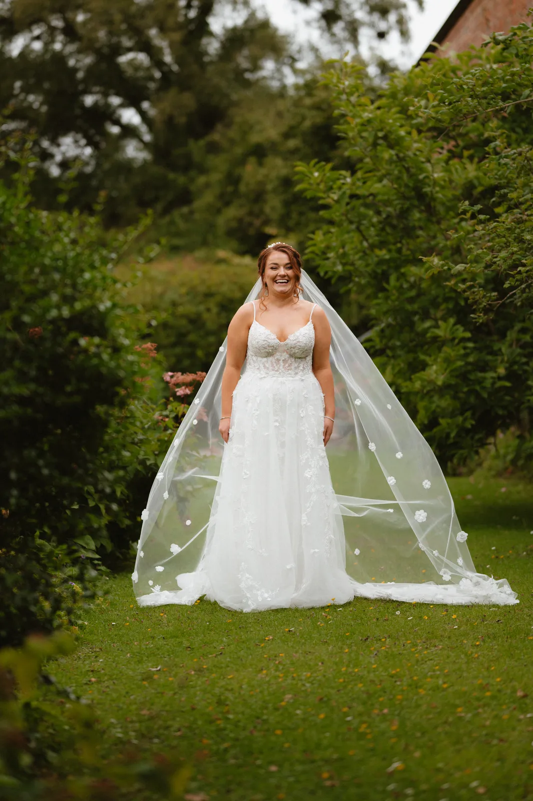 Claire’s dress and veil on the lawn