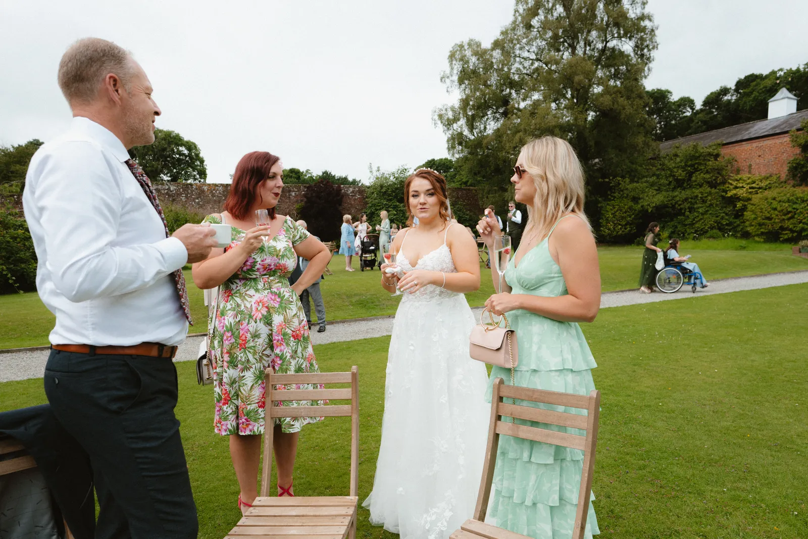 Guests talking on the lawn