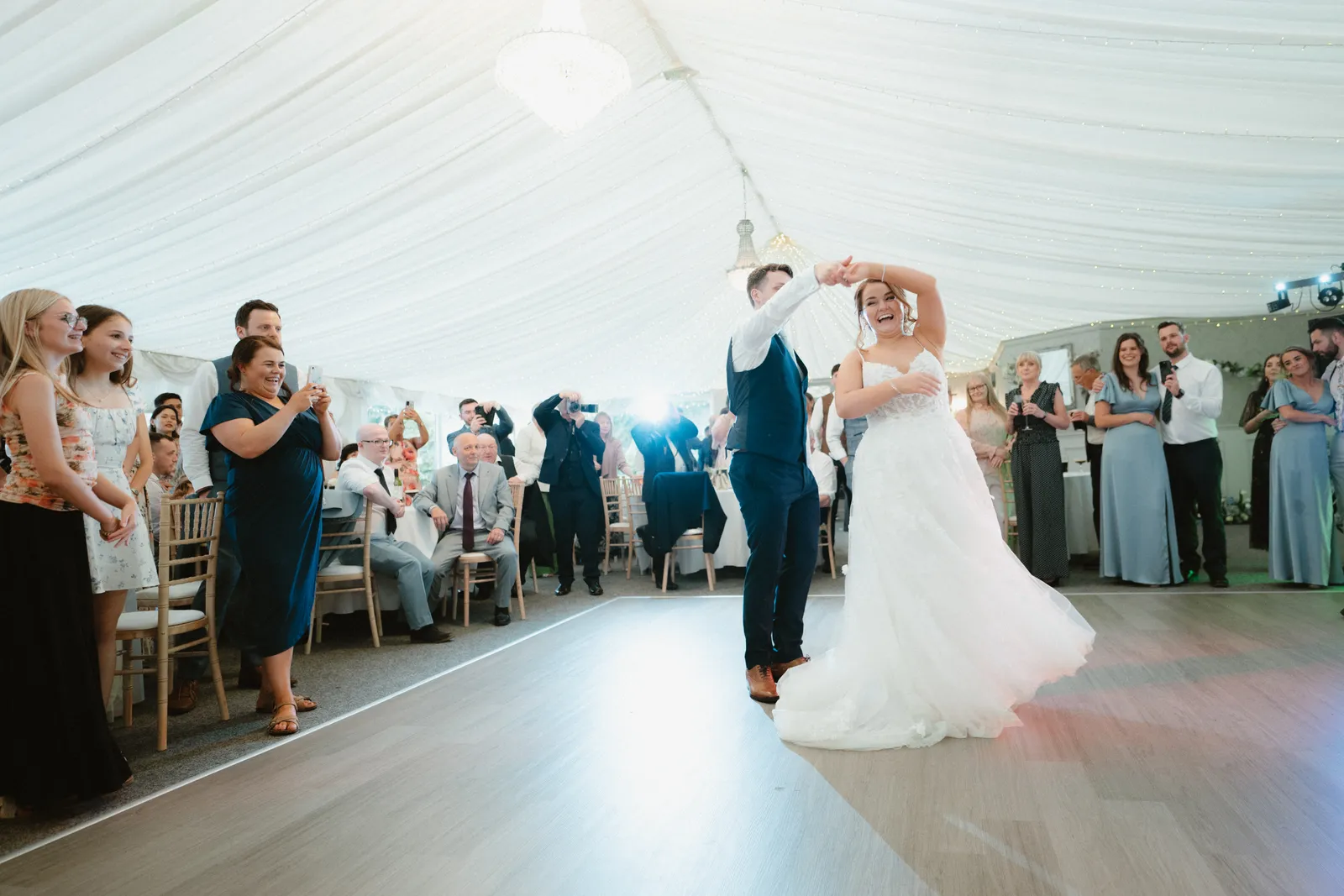 Claire turns beside Will on the dance floor