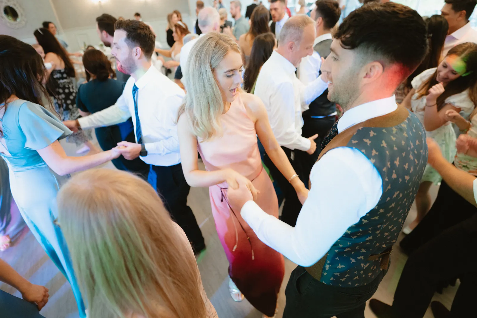 Guests gather on the dance floor