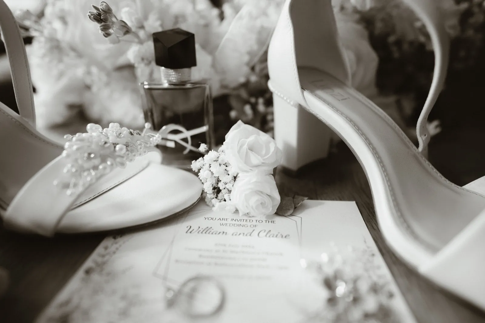 Wedding shoes with jewellery and stationery
