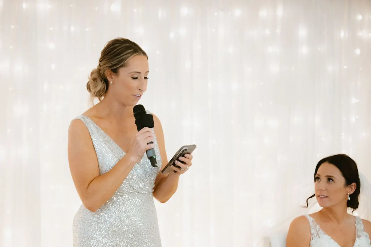 Candid moments during wedding speeches at Killeavy Castle in Northern Ireland