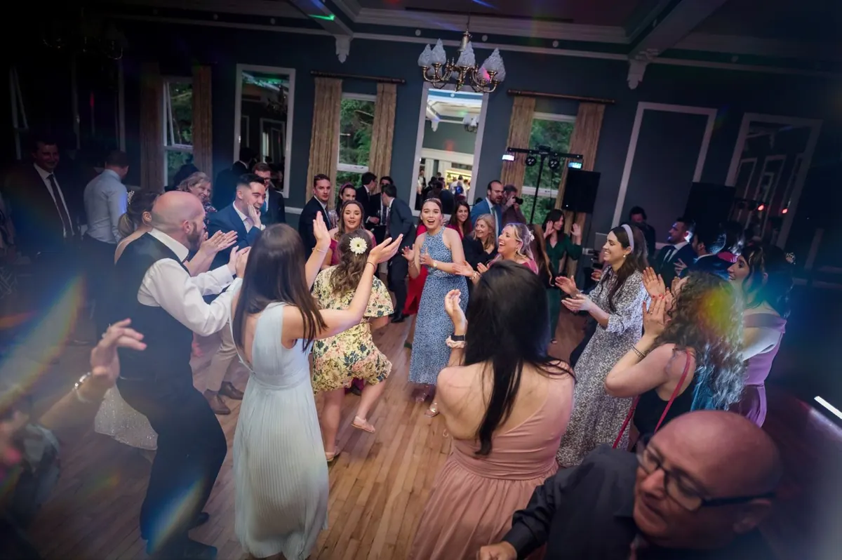 Guests gathered around the couple on the evening dance floor
