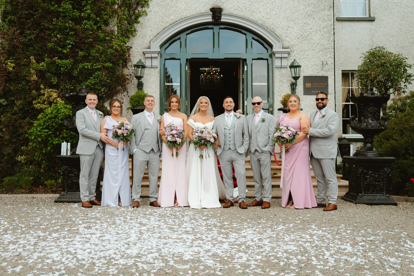 The wedding party outside the entrance