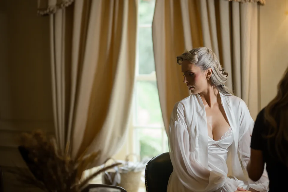 Window-light preparation sets the morning scene.