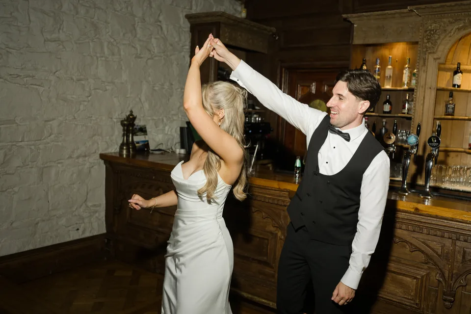 Jay spins Holly during an early dance-floor moment.