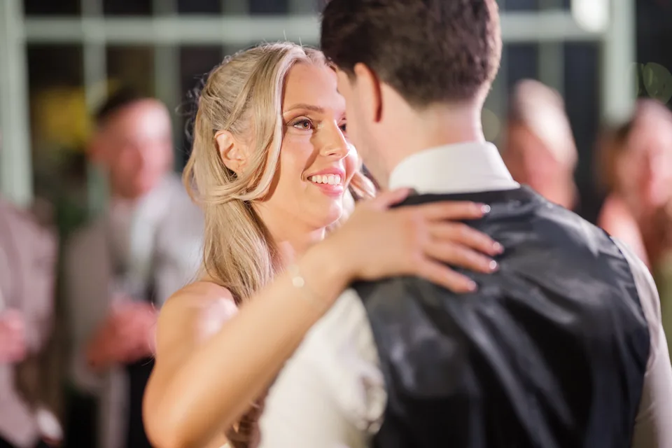 Holly's close smiling expression during the first dance.