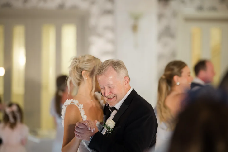 Ieva sharing a dance with her father at Manor House Country Hotel
