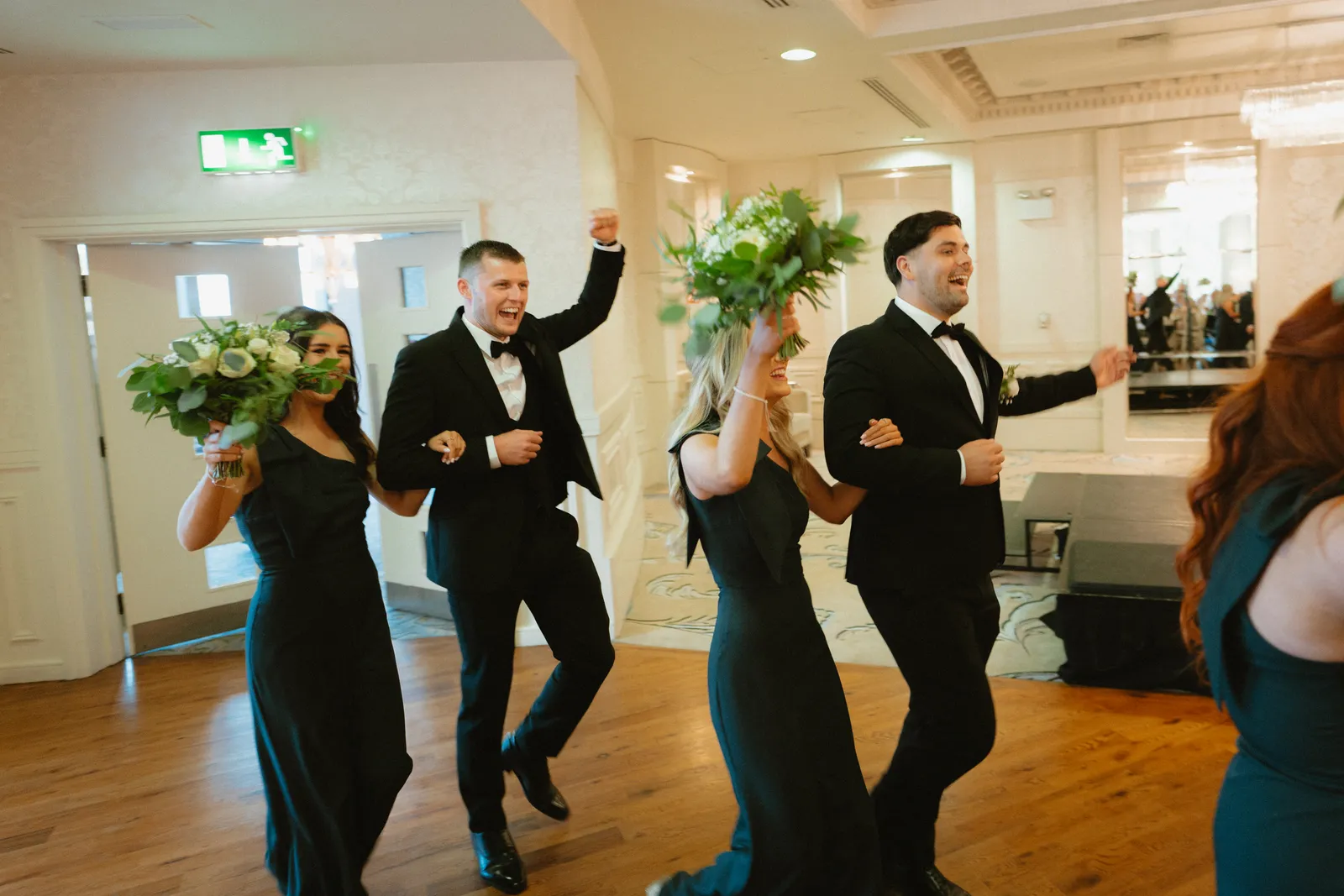 Guests arriving with raised hands