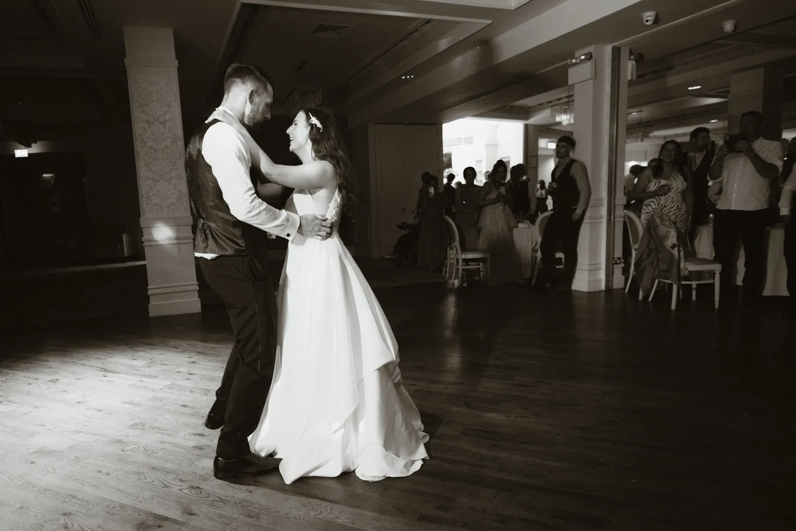 The couple dancing in black and white