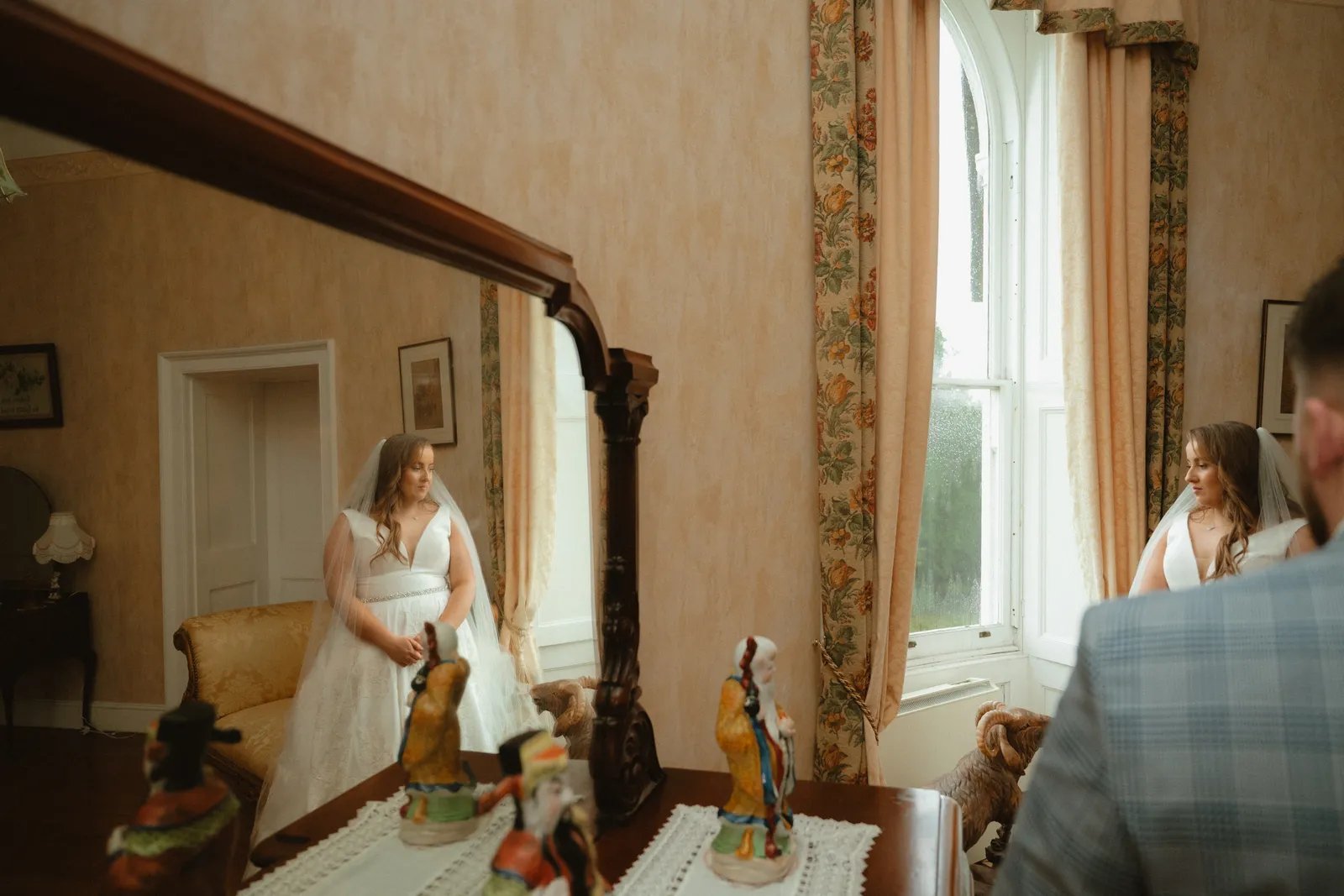 The couple reflected in a mirror