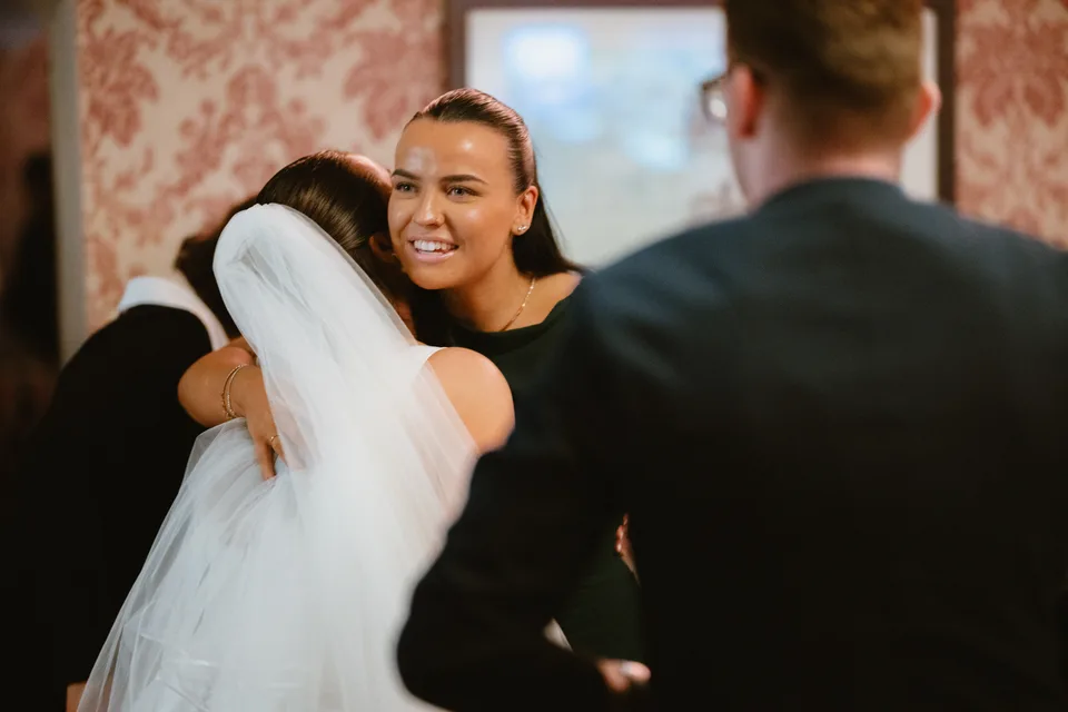 Lynsey sharing an embrace during the drinks reception.