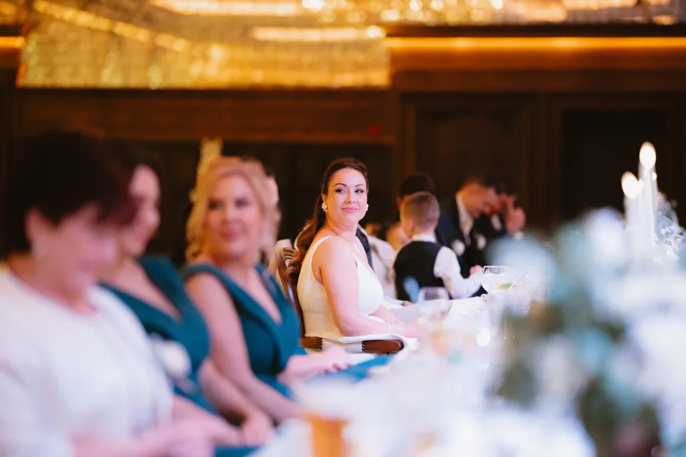 Lynsey watching the speeches from the reception table.