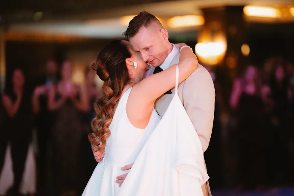 Lynsey and Jamie holding one another during their first dance.