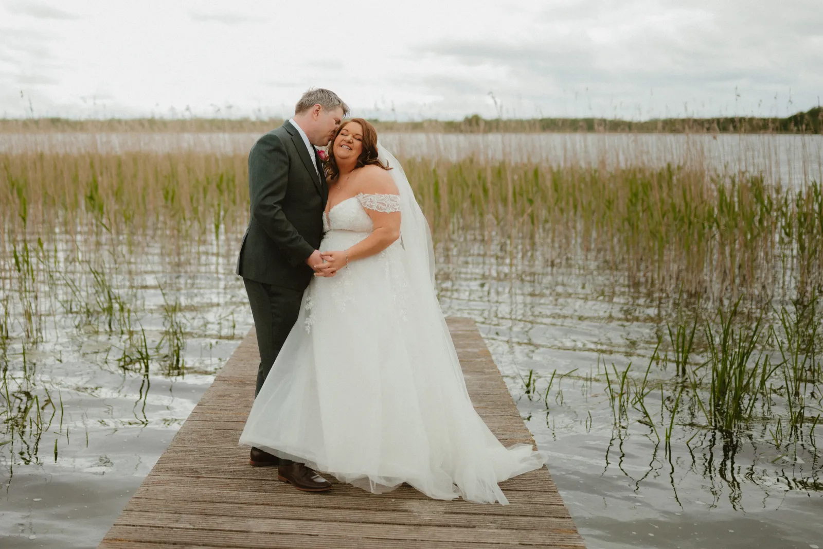 Michelle and Ray on the jetty among the reeds
