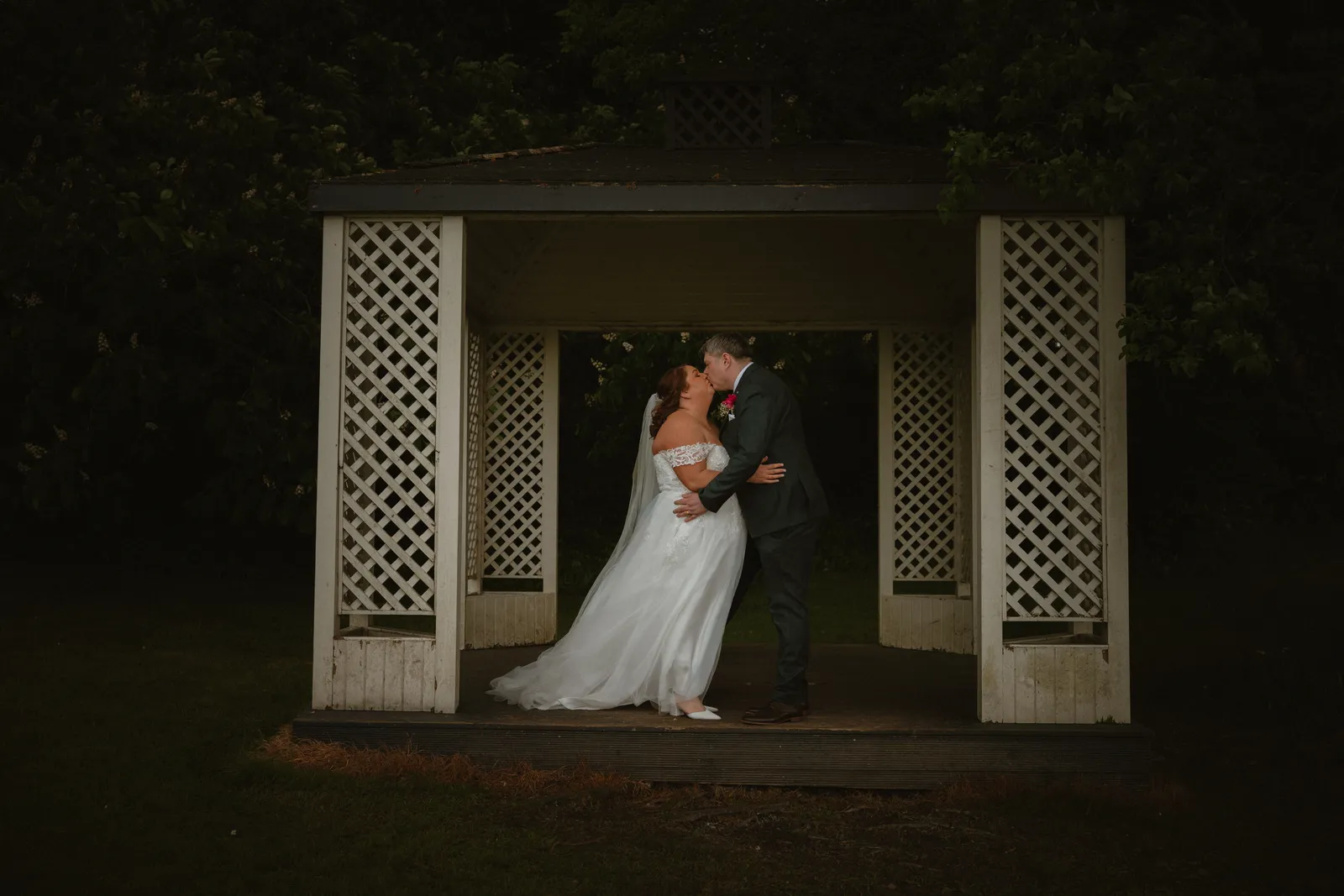 Michelle and Ray framed by the garden shelter
