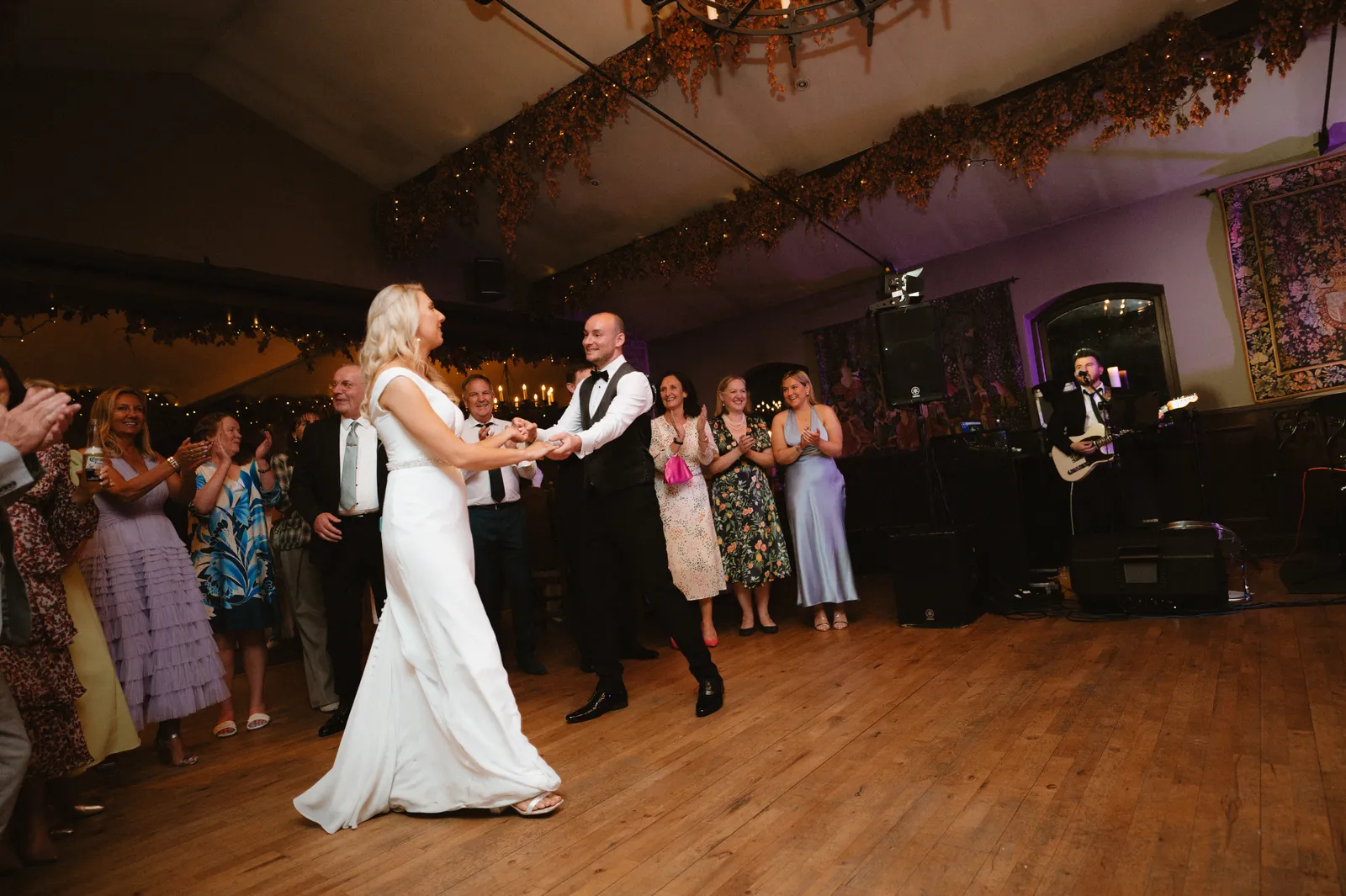 The couple framed by the reception room