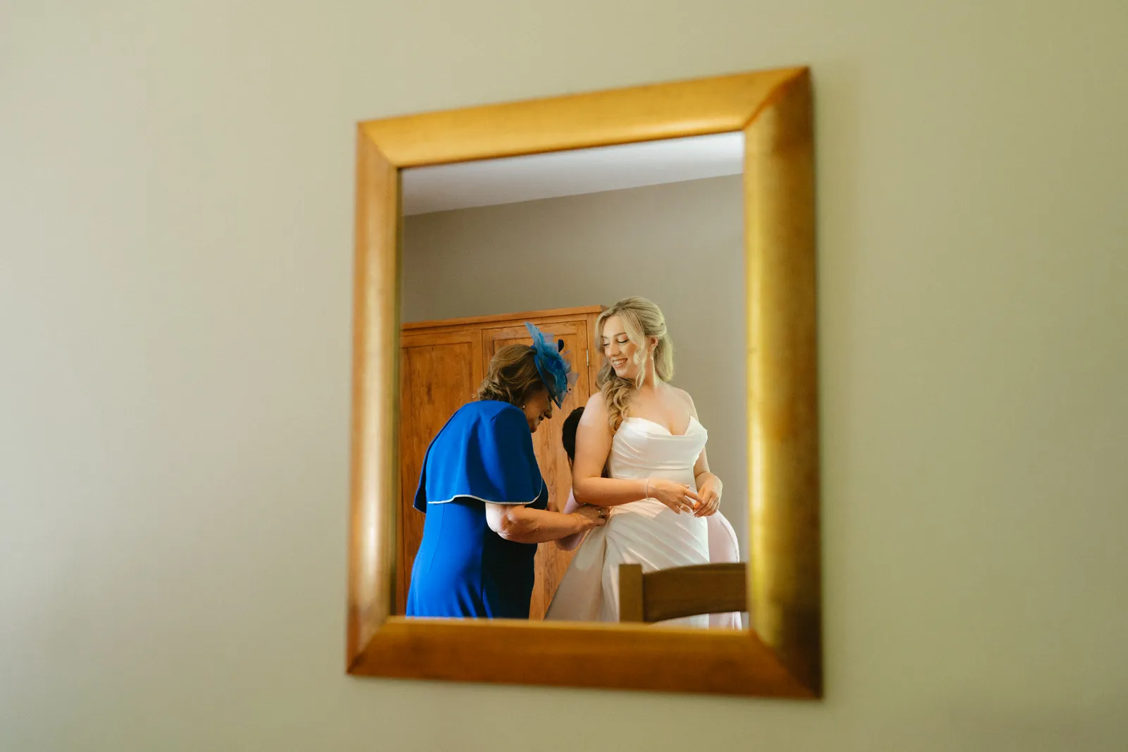The preparations reflected in a gold mirror