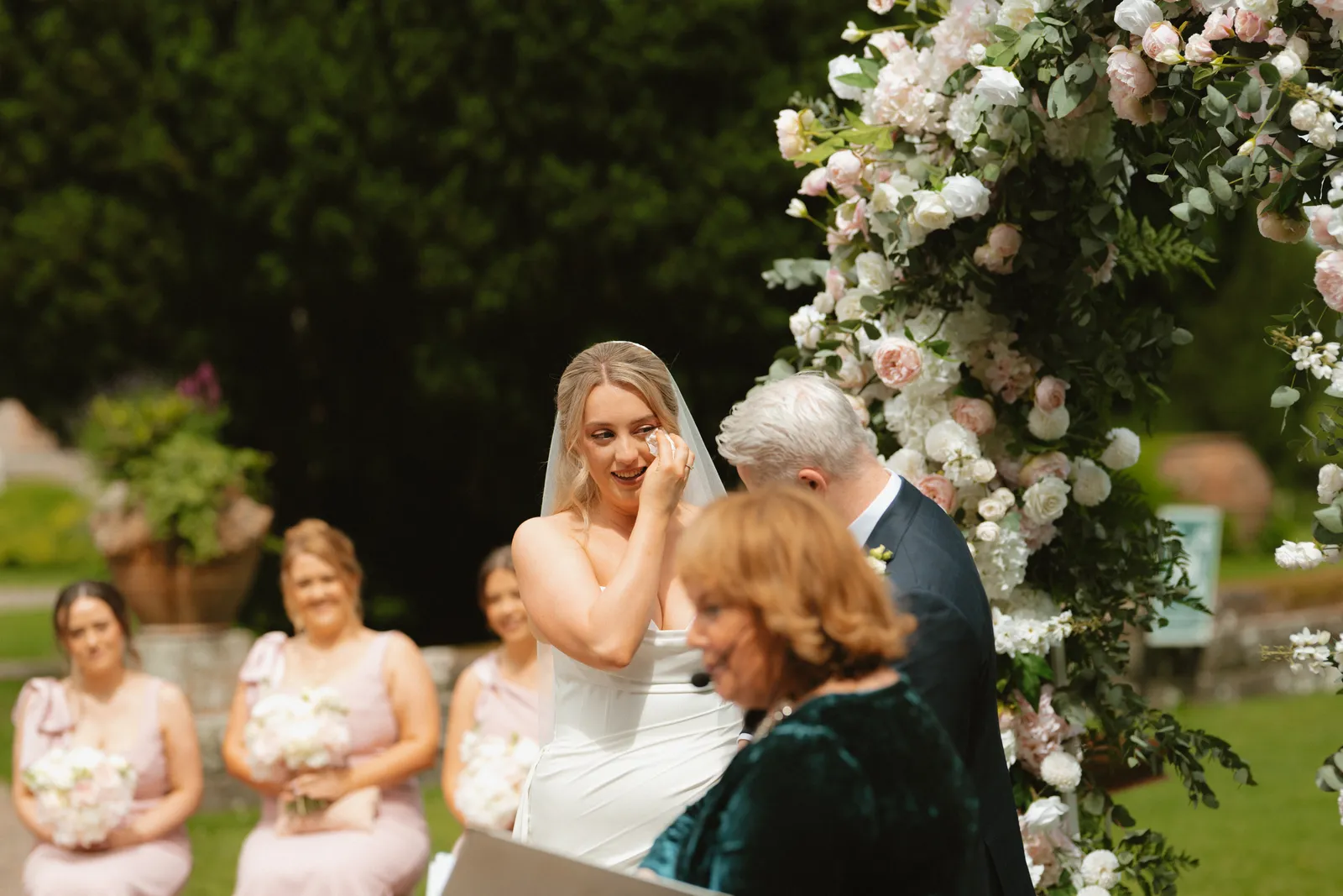 Roslyn wiping her eye during the ceremony