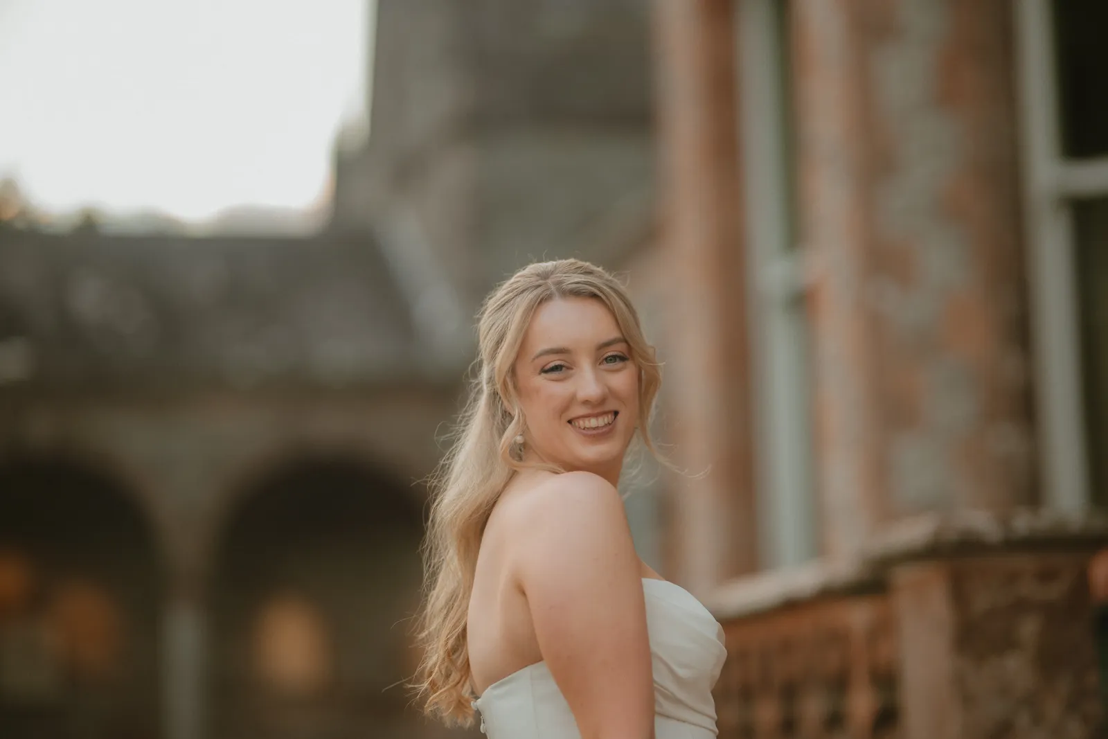 Roslyn smiling outside the house