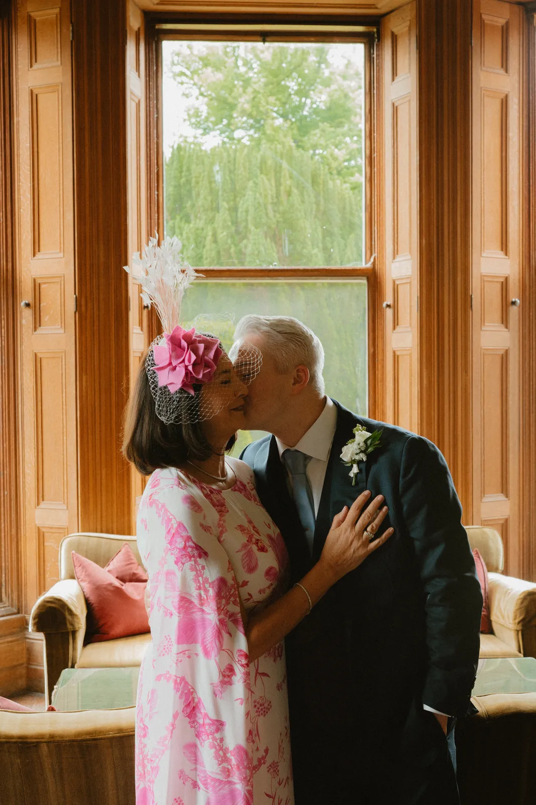 Guests greeting each other with a kiss