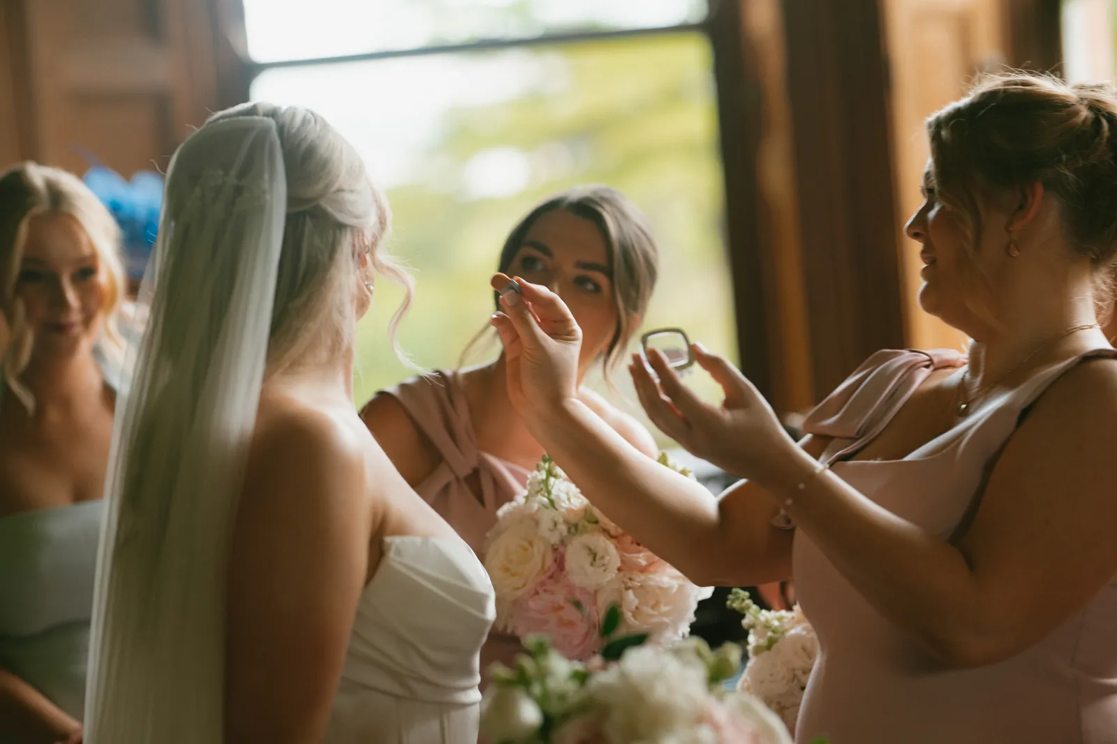 A veil adjustment beside the windows
