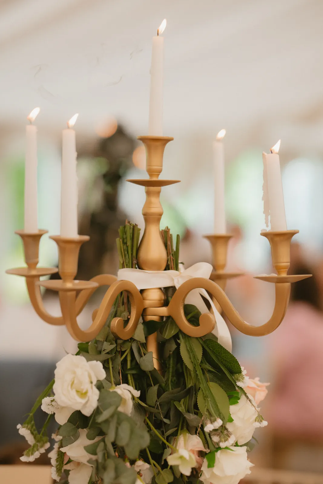Candles and flowers on a reception table