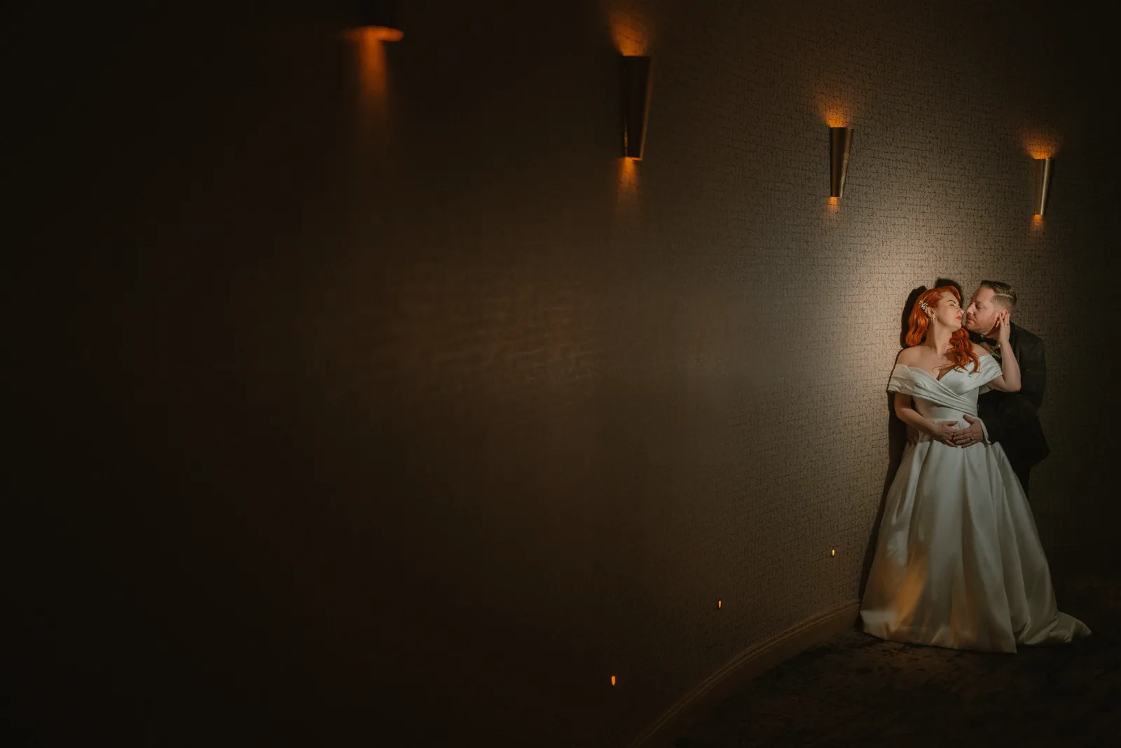 Sarah and Mark together in a pool of light at Lawlor’s of Naas