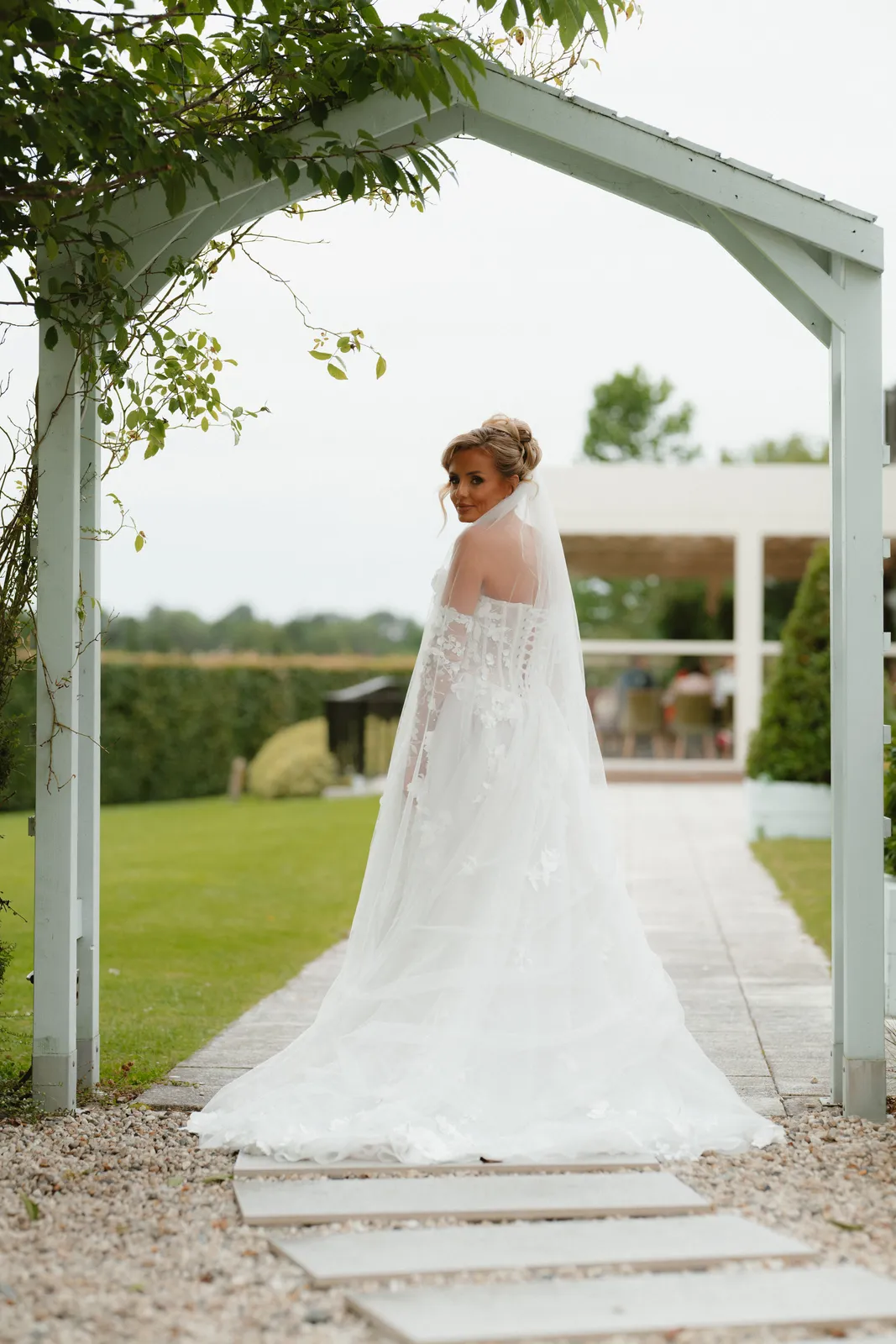 The train of Tara’s dress outdoors