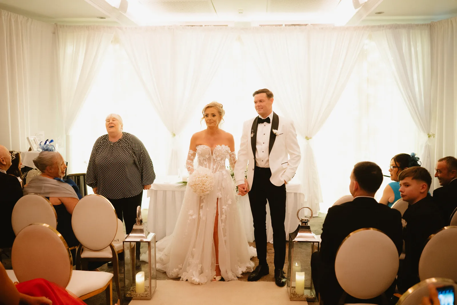 The couple walk out together