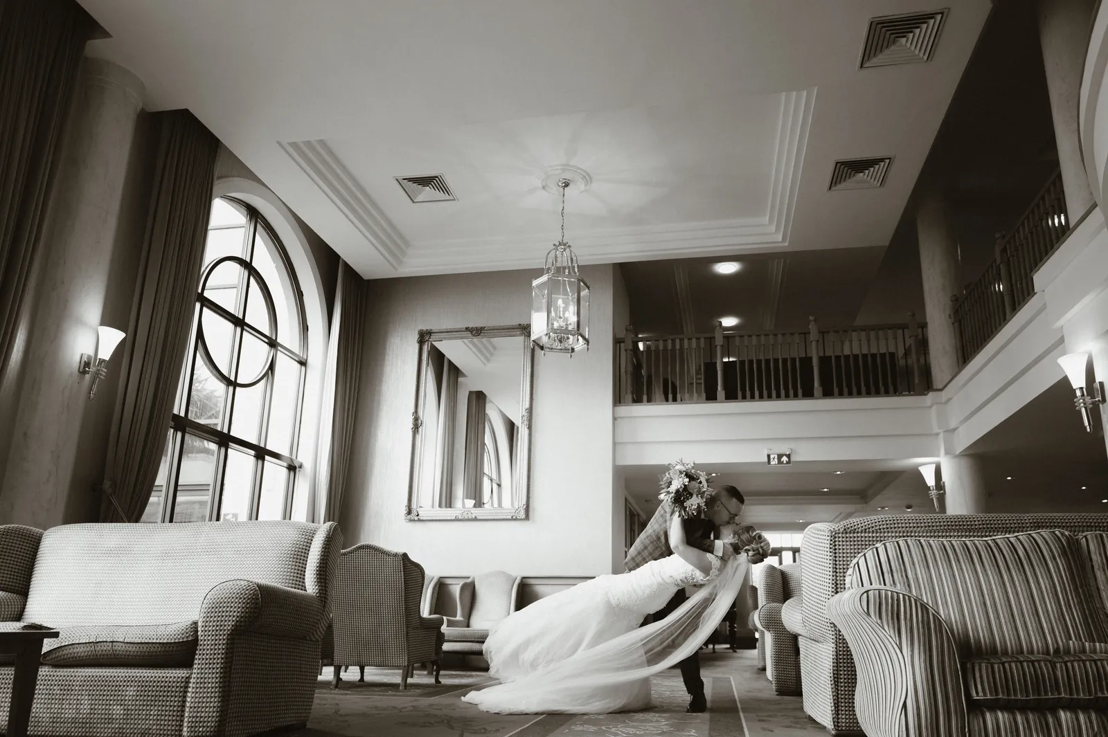 The couple seated in the bright interior